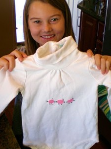 Emily’s Finger-Print paint shirts….